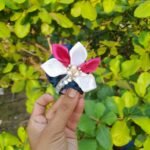 Handmade Laddu Gopal designer mukut with blue velvet base pink white petals