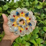 Yellow Laddu Gopal dress with peacock feather design mirror work pearl decoration front view